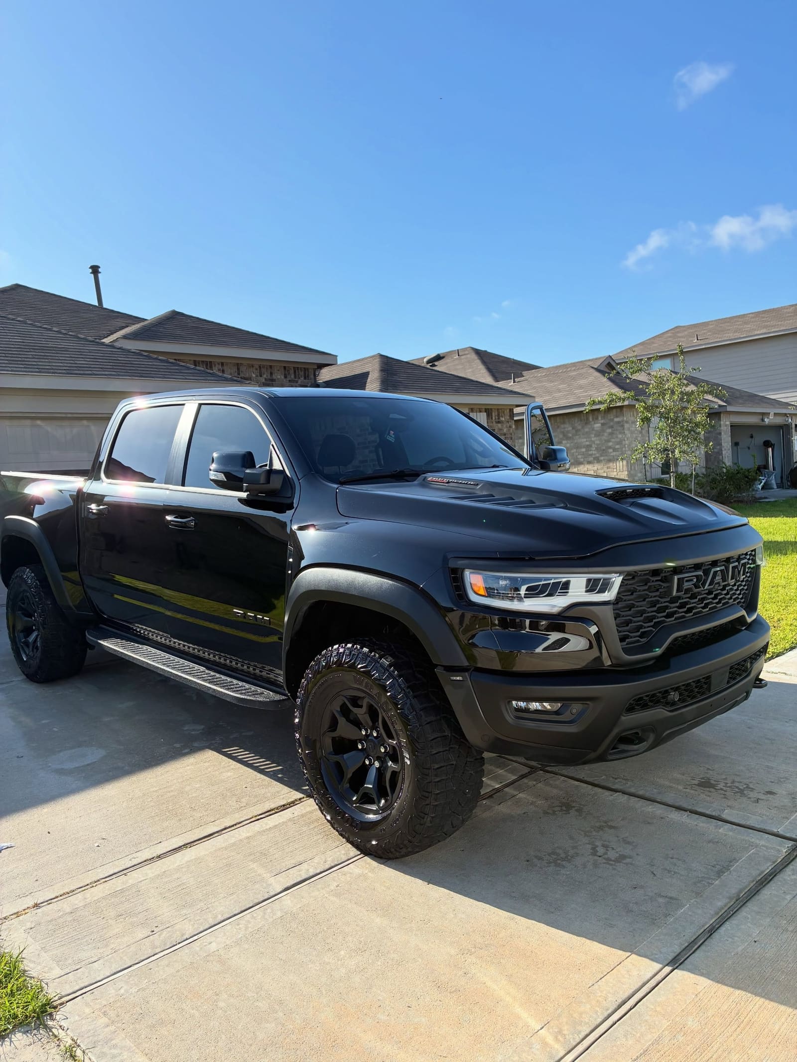Black RAM TRX detailed on a driveway in west Houston